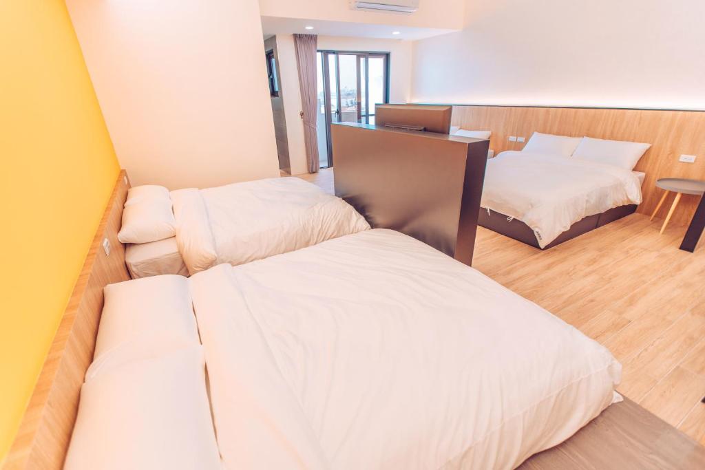Postel nebo postele na pokoji v ubytování The Pai Hotel