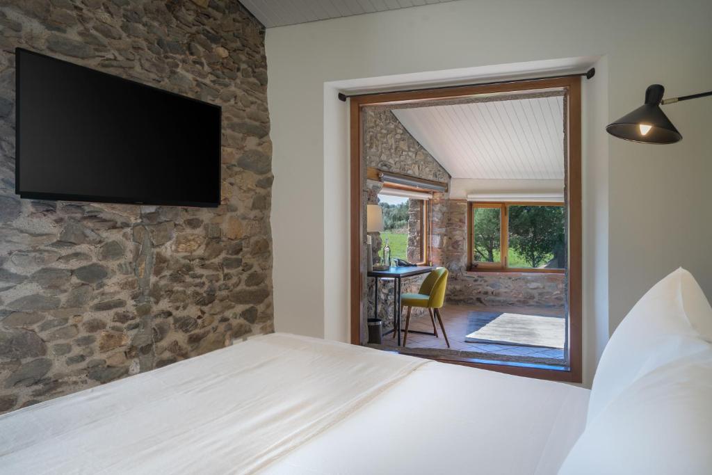Postel nebo postele na pokoji v ubytování Hotel Mas del Sol