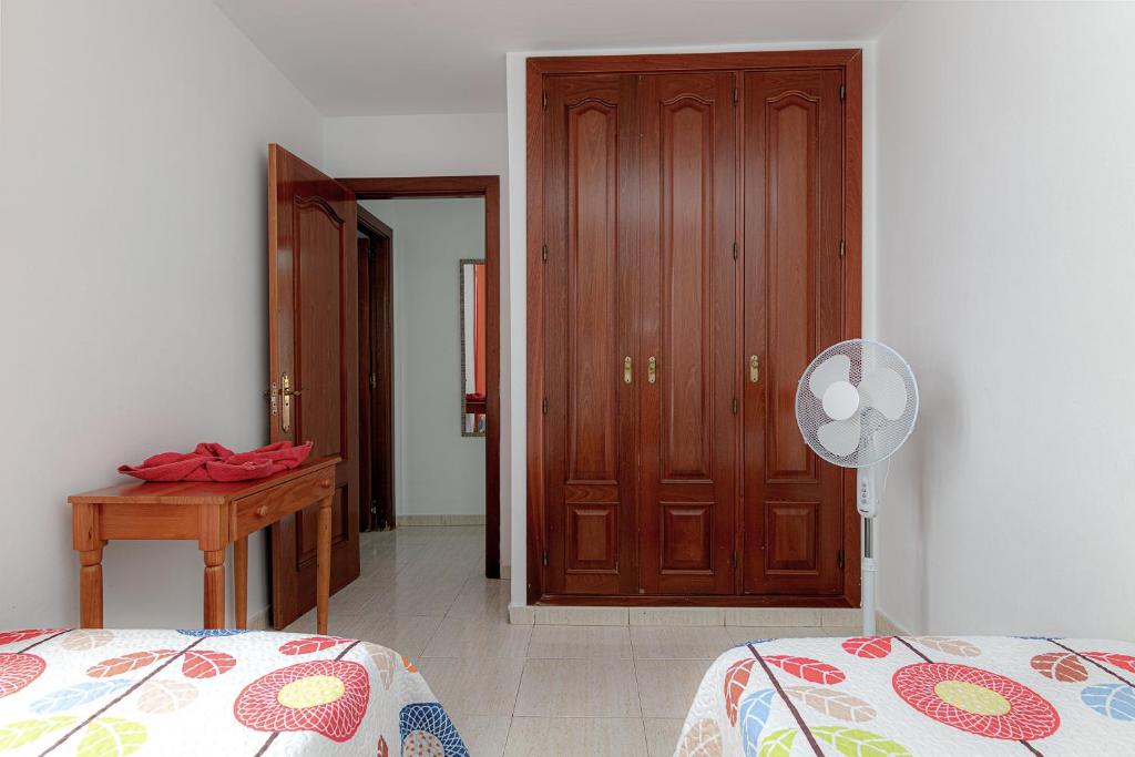 Postel nebo postele na pokoji v ubytování Apartamento Ideal Costa Teguise