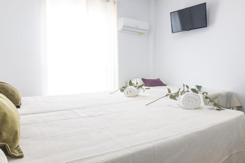 Postel nebo postele na pokoji v ubytování Hotel Marhava