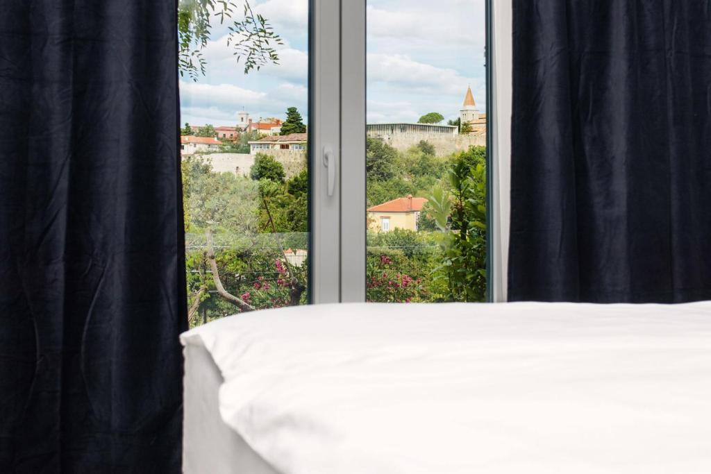 Postel nebo postele na pokoji v ubytování Marina di Portapisana Luxury private villa