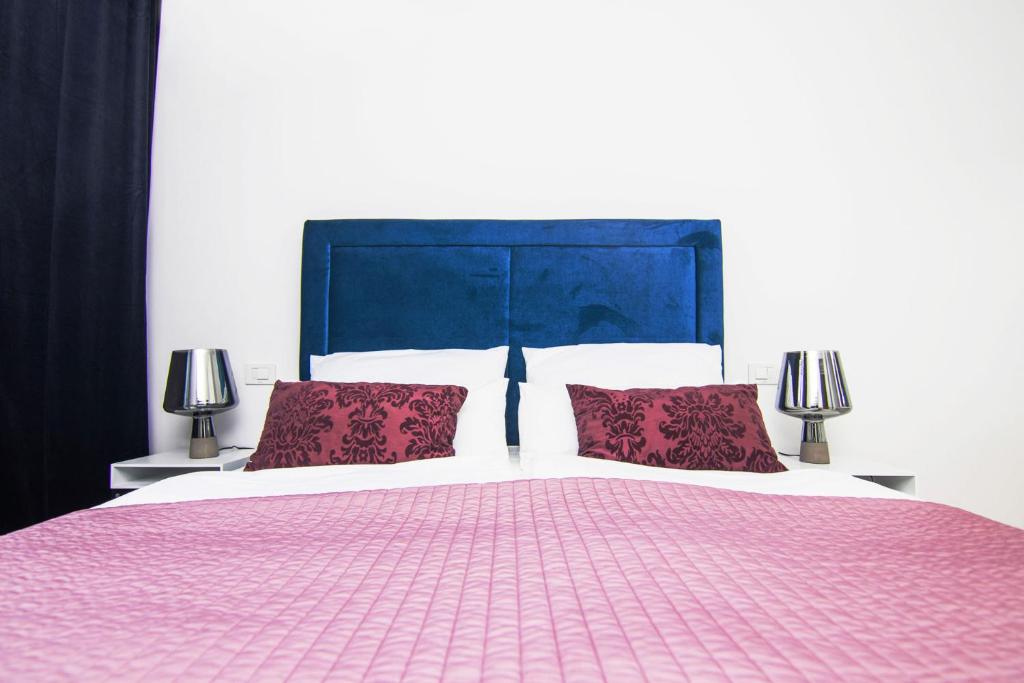 Postel nebo postele na pokoji v ubytování Marina di Portapisana Luxury private villa