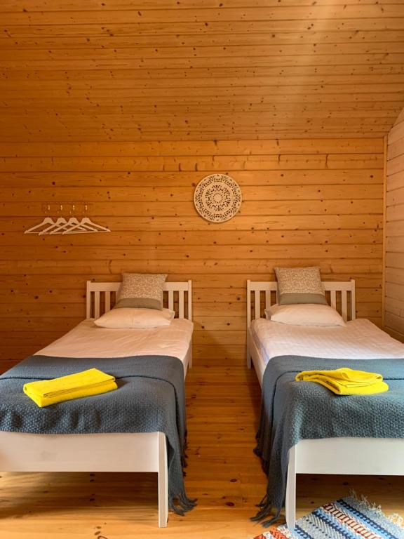 Postel nebo postele na pokoji v ubytování Tahkuna Puhkekeskus