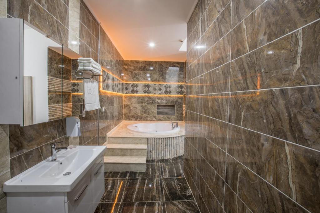 Koupelna v ubytování Elanis Suites