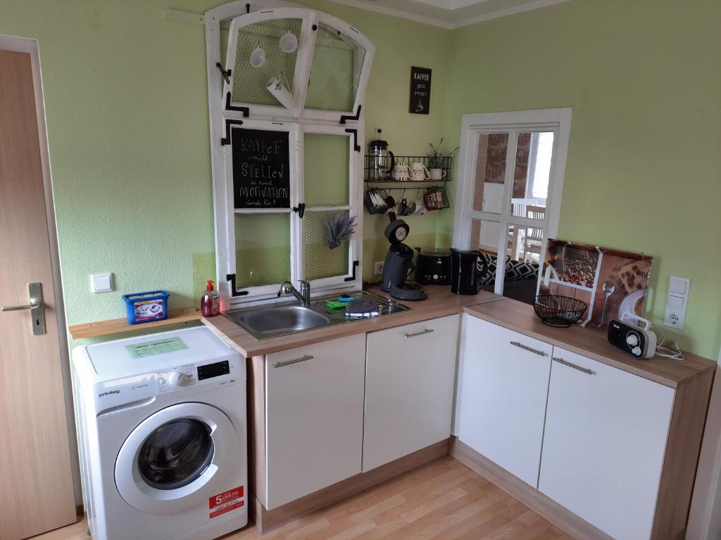 Kuchyň nebo kuchyňský kout v ubytování Ferienwohnung FLAIR
