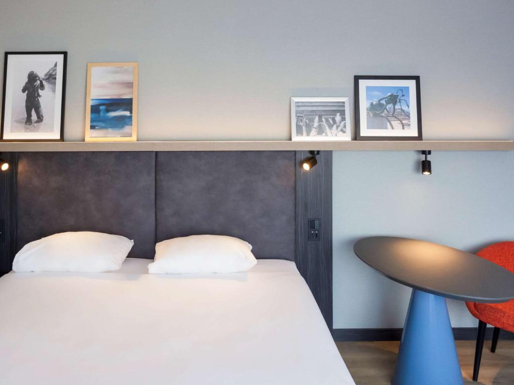 Postel nebo postele na pokoji v ubytování ibis Styles Den Haag Scheveningen