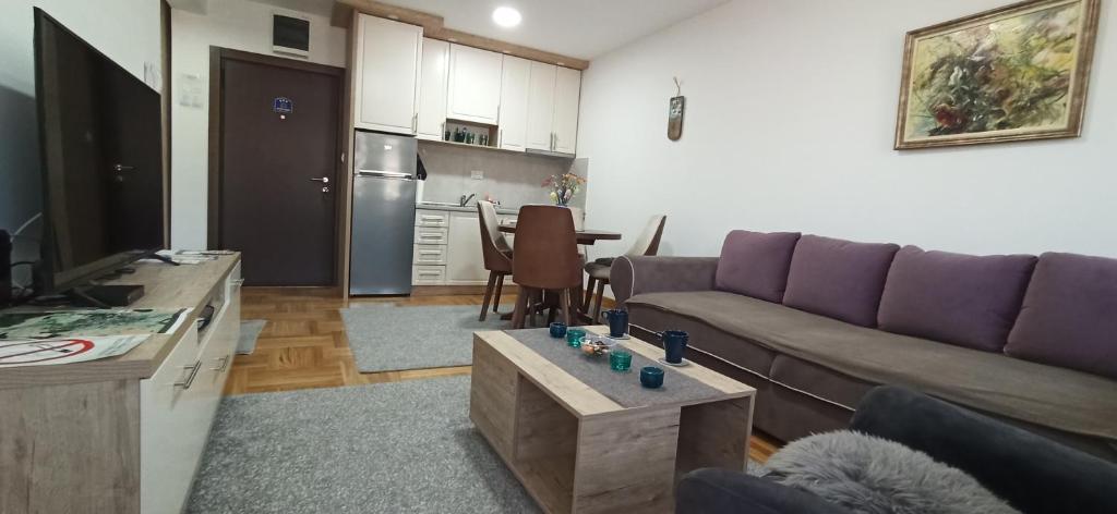 Kuchyň nebo kuchyňský kout v ubytování Apartman N&N