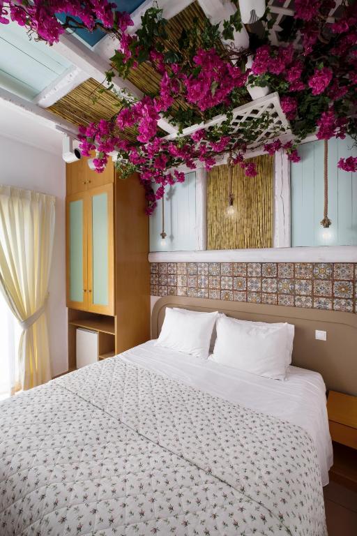 Postel nebo postele na pokoji v ubytování Hotel Segas