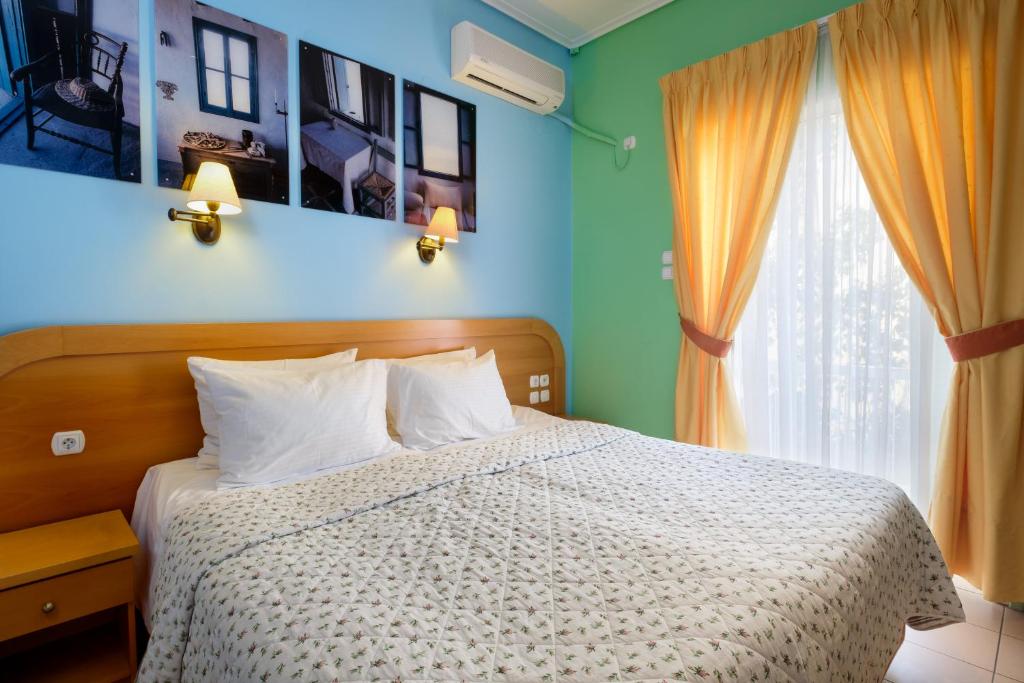 Postel nebo postele na pokoji v ubytování Hotel Segas