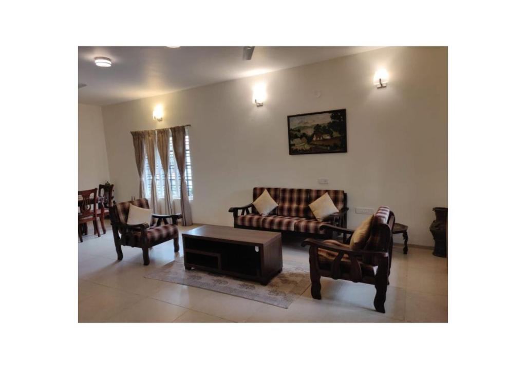 Posezení v ubytování Stays 42 - Oleander Suites Coorg