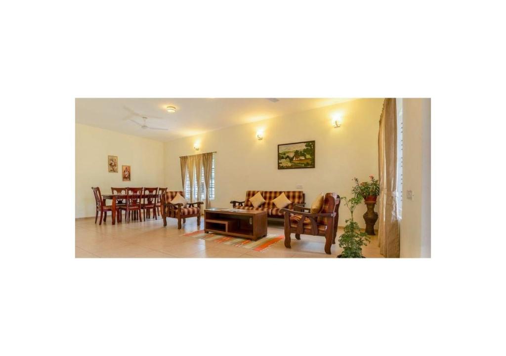 Posezení v ubytování Stays 42 - Oleander Suites Coorg