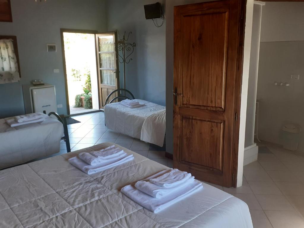 Postel nebo postele na pokoji v ubytování Agriturismo la Gioia