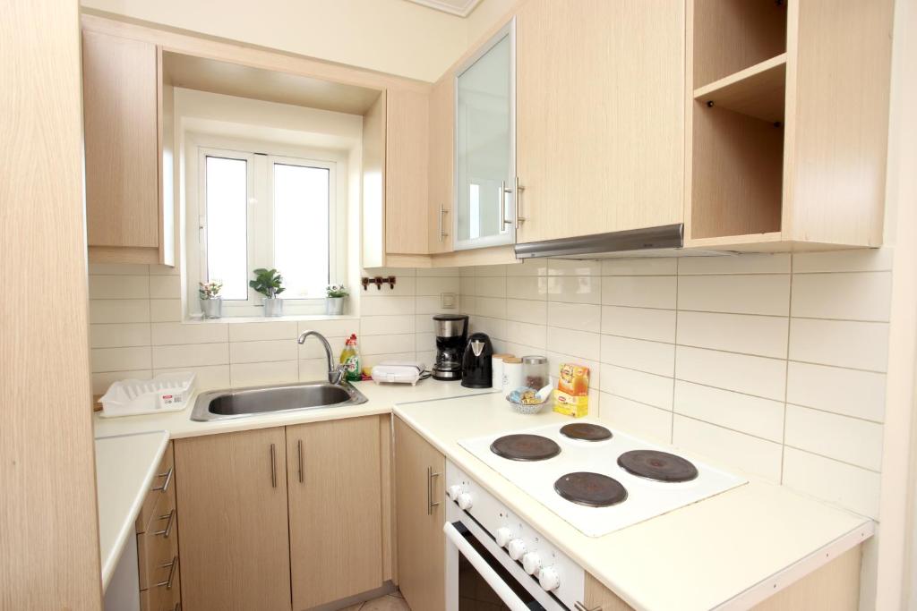 Kuchnia lub aneks kuchenny w obiekcie Apartment near the Athens Airport, Spata