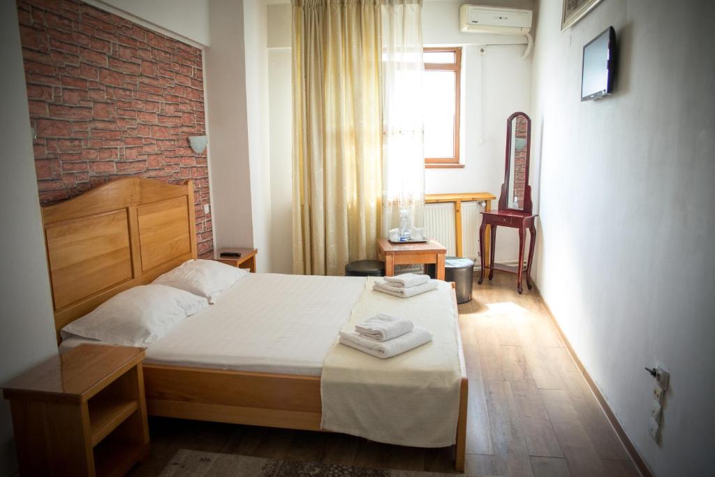Postel nebo postele na pokoji v ubytování Hotel Funnytime