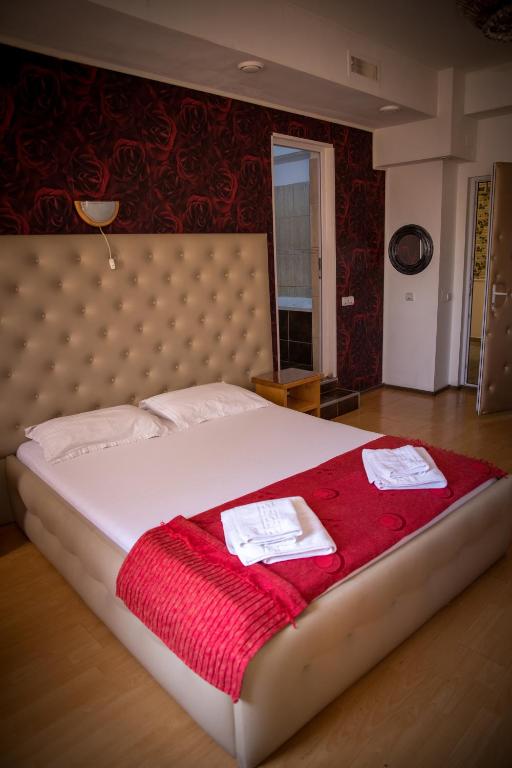 Postel nebo postele na pokoji v ubytování Hotel Funnytime