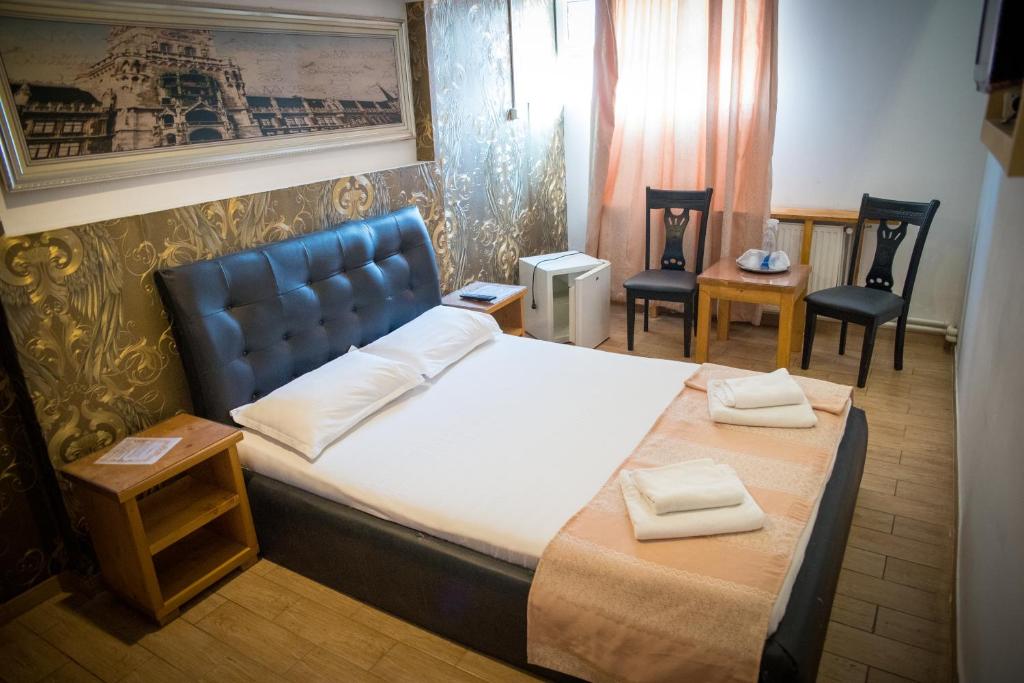 Postel nebo postele na pokoji v ubytování Hotel Funnytime