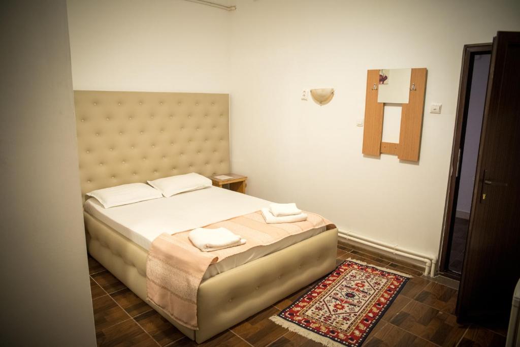 Postel nebo postele na pokoji v ubytování Hotel Funnytime