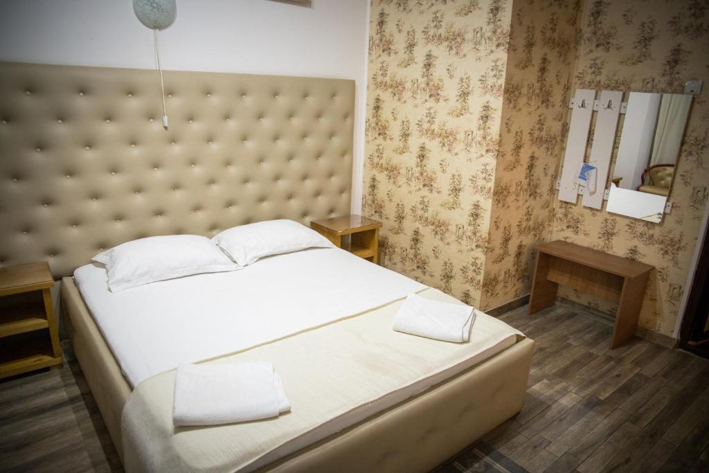 Postel nebo postele na pokoji v ubytování Hotel Funnytime