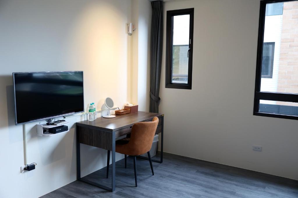 TV a/nebo společenská místnost v ubytování 9 Tan Yuan Homestay