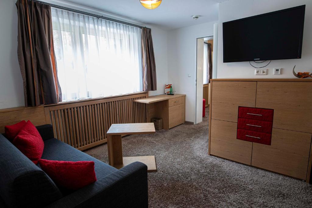 TV a/nebo společenská místnost v ubytování Hotel Lucia - 3 Sterne Superior