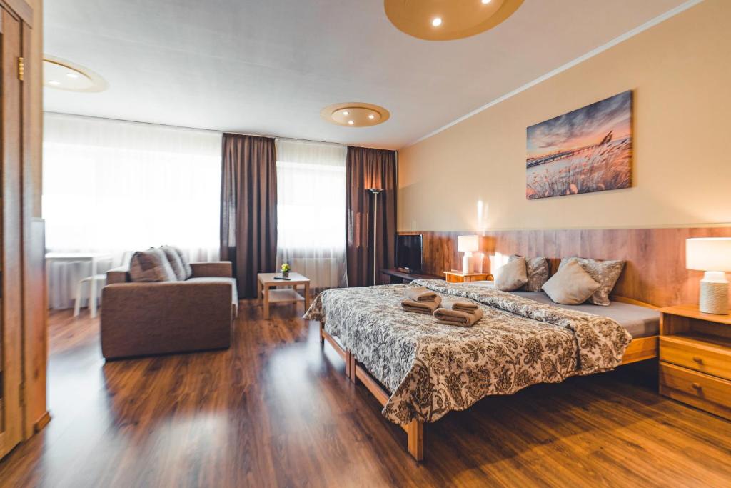 Postel nebo postele na pokoji v ubytování O.K. Hotel