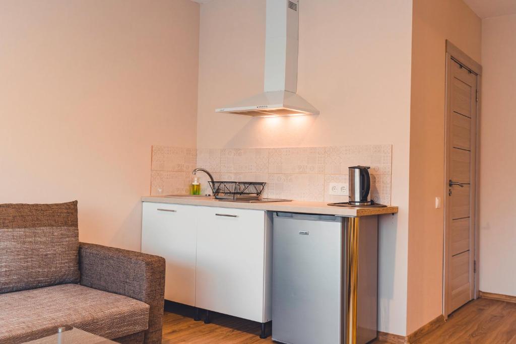 Kuchyň nebo kuchyňský kout v ubytování O.K. Hotel