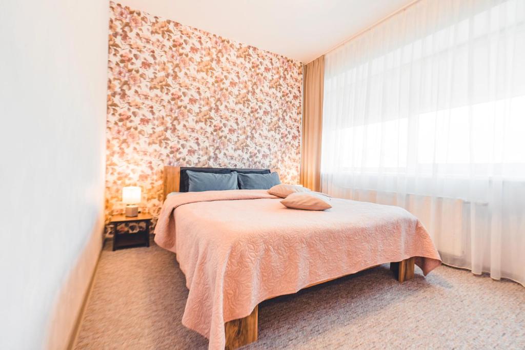 Postel nebo postele na pokoji v ubytování O.K. Hotel