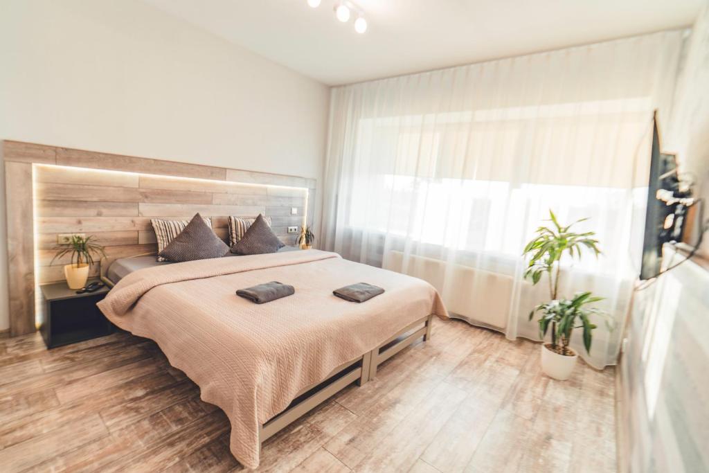 Postel nebo postele na pokoji v ubytování O.K. Hotel