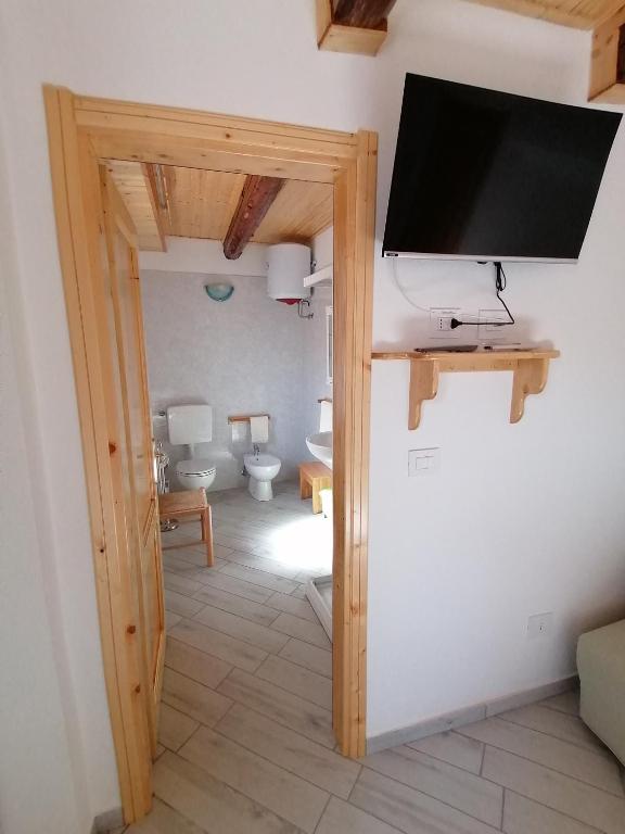 Televízia a/alebo spoločenská miestnosť v ubytovaní Al Souvenir