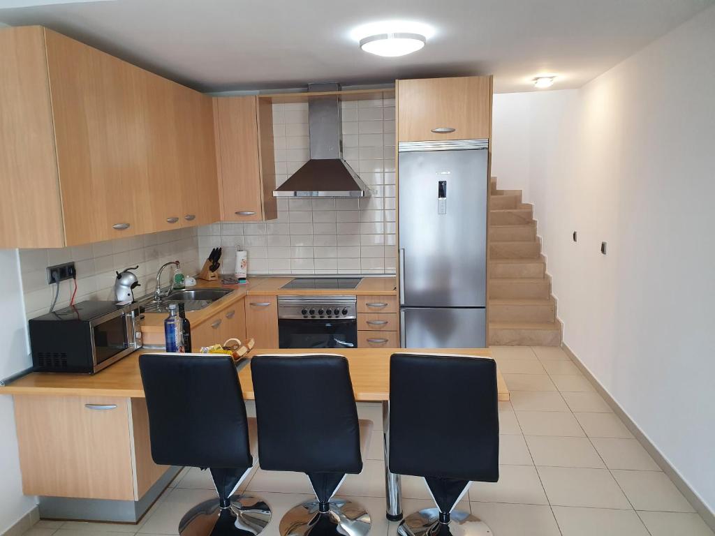 Kuchyň nebo kuchyňský kout v ubytování Él Rome Duplex