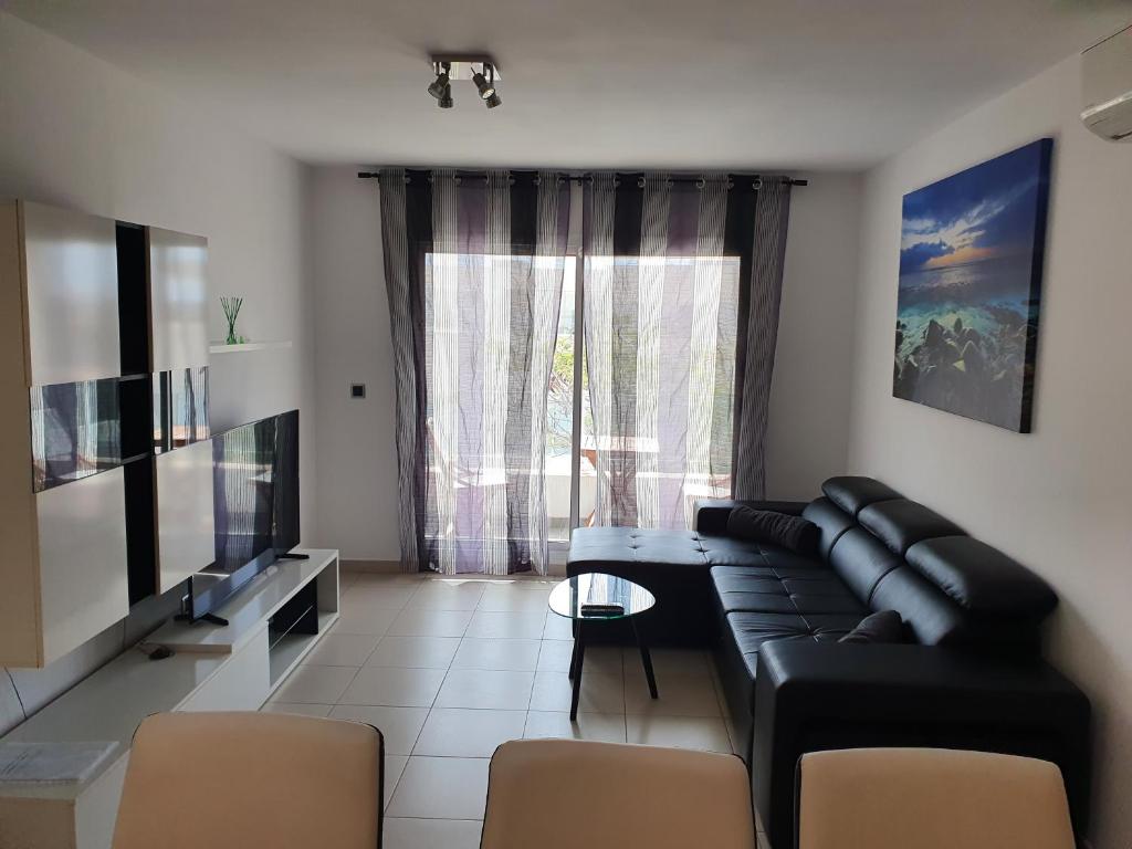 TV a/nebo společenská místnost v ubytování Él Rome Duplex