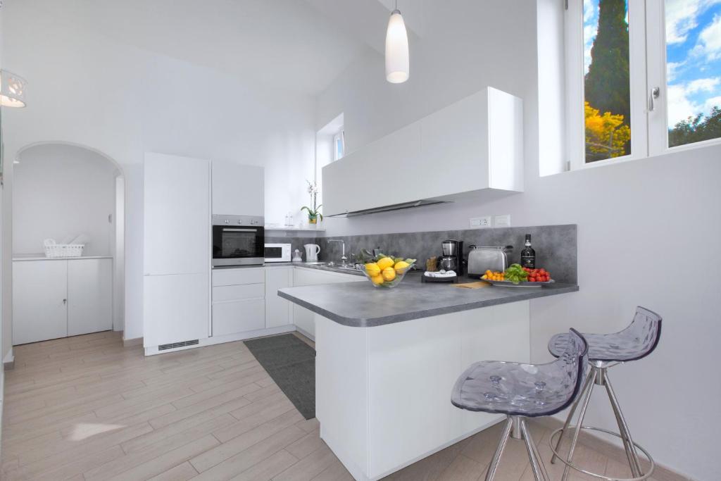 Kuchnia lub aneks kuchenny w obiekcie Amore Rentals - Villa Anna
