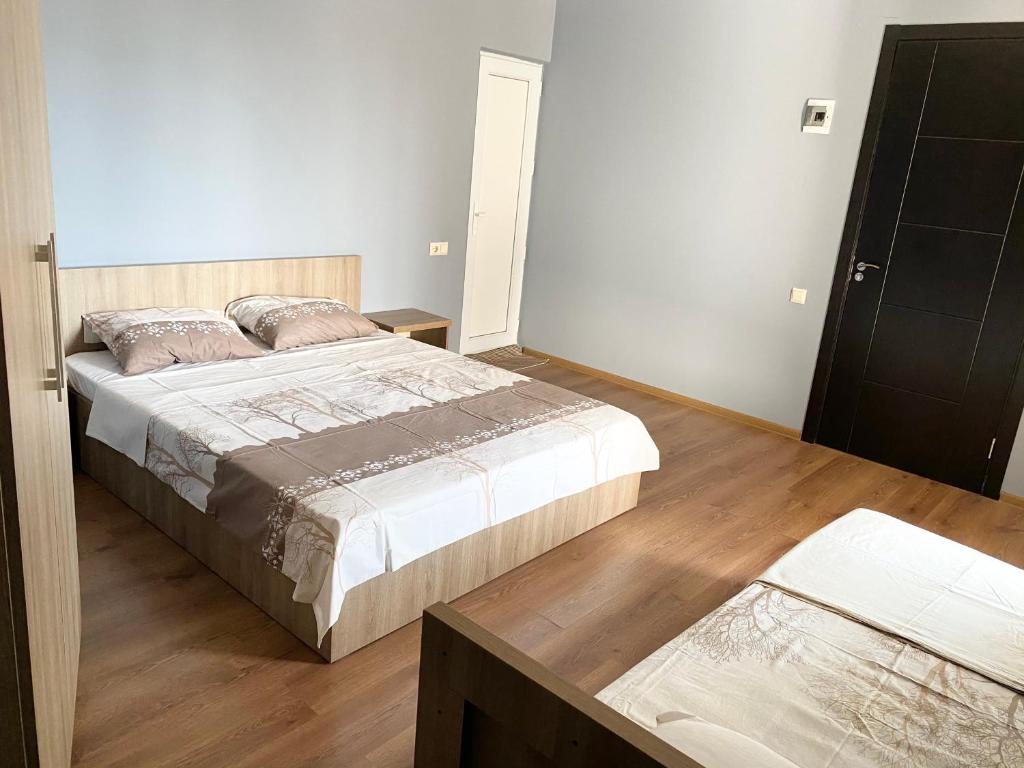 Ένα ή περισσότερα κρεβάτια σε δωμάτιο στο Hotel Charli