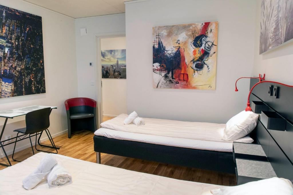 Postel nebo postele na pokoji v ubytování City HotelApartment