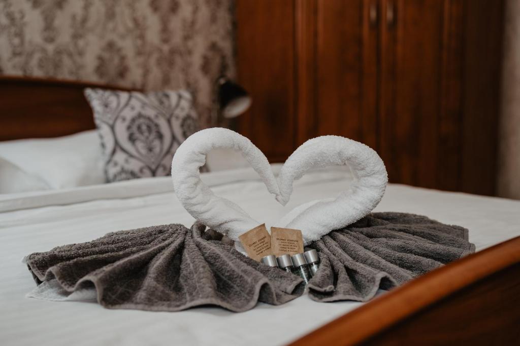 Postel nebo postele na pokoji v ubytování Hotel U Lípy