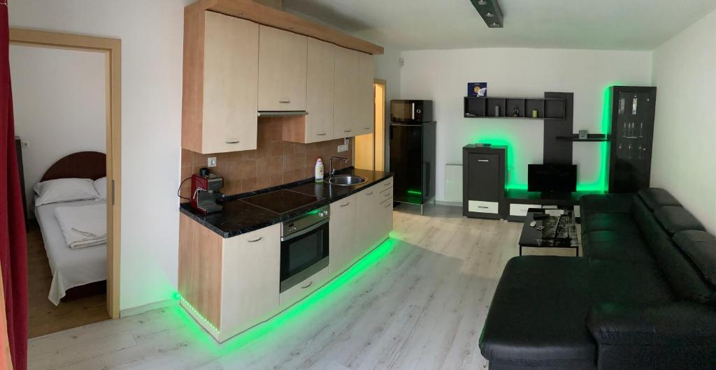 Kuchyňa alebo kuchynka v ubytovaní Apartment City Inn Pécs