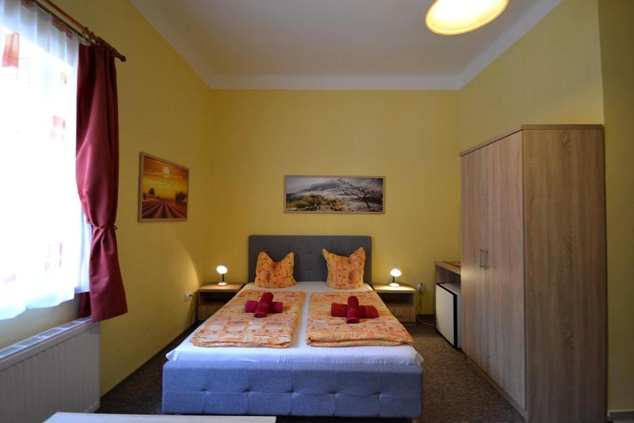 Postel nebo postele na pokoji v ubytování Guest House Silatti - Apartments
