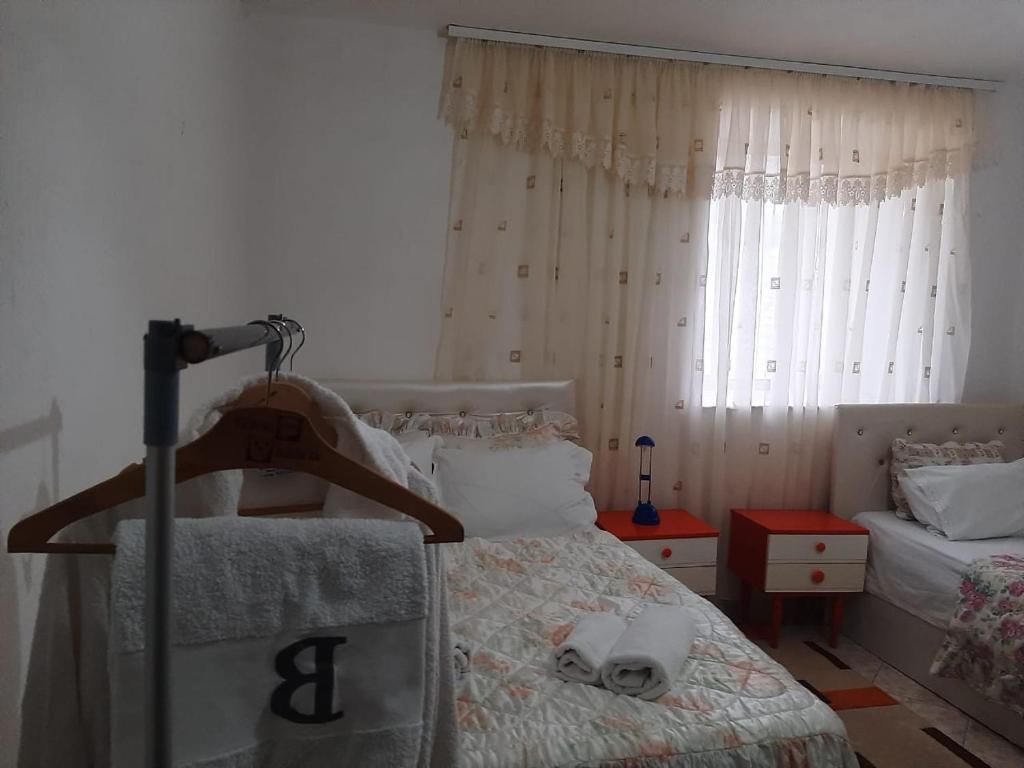 Postel nebo postele na pokoji v ubytování Vrenjo GuestHouse