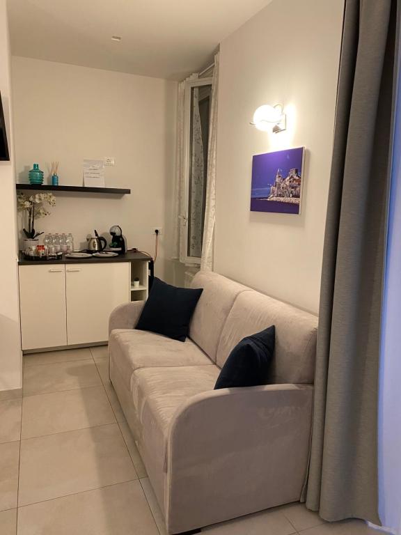 Posezení v ubytování Alba rooms