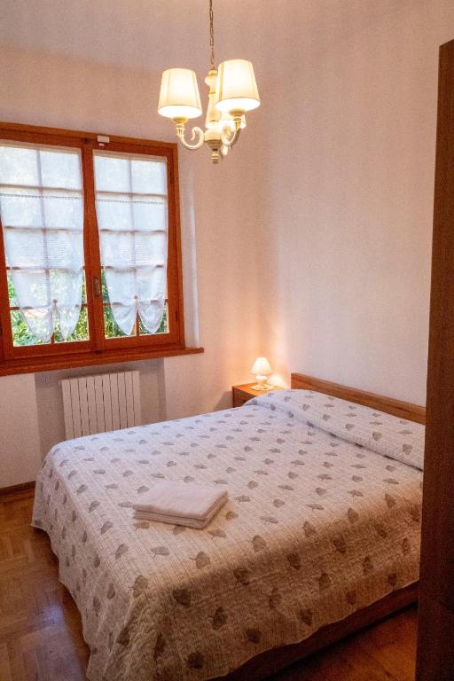 Postel nebo postele na pokoji v ubytování Poggio Leporaia