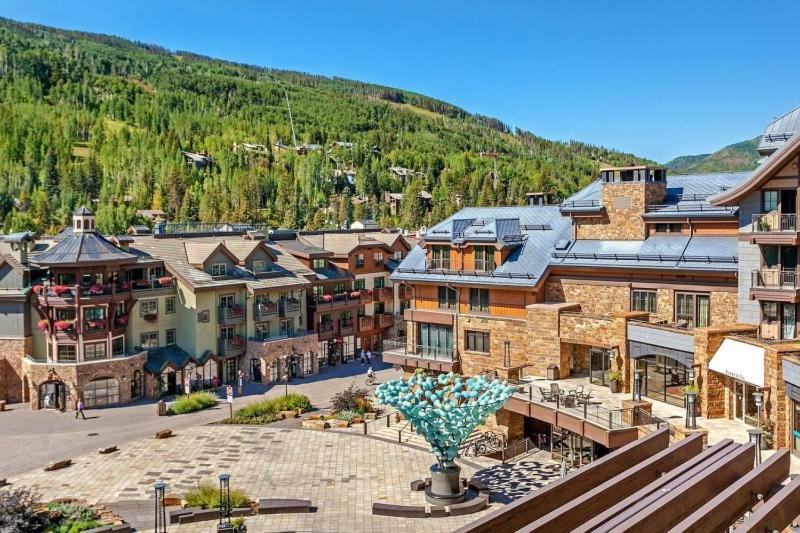 an aerial view of a town with a mountain at Platinum Vail Solaris 1 Bedroom Vacation Rental Set At The Base Of The Mountain Just Steps From The Gondola in Vail