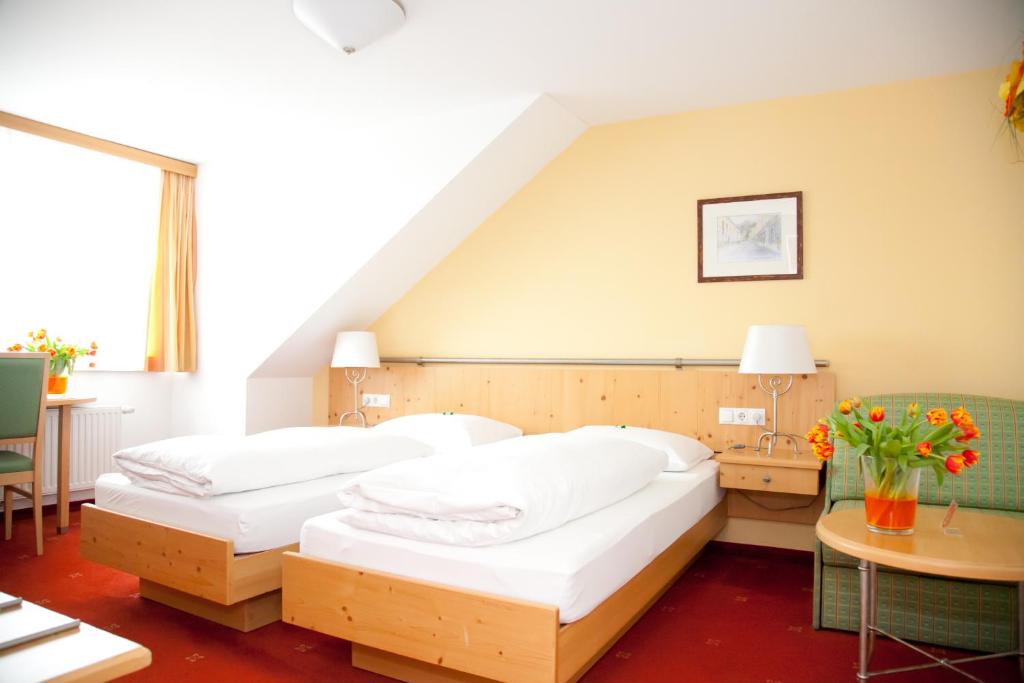 Postel nebo postele na pokoji v ubytování Hotel Kohlpeter