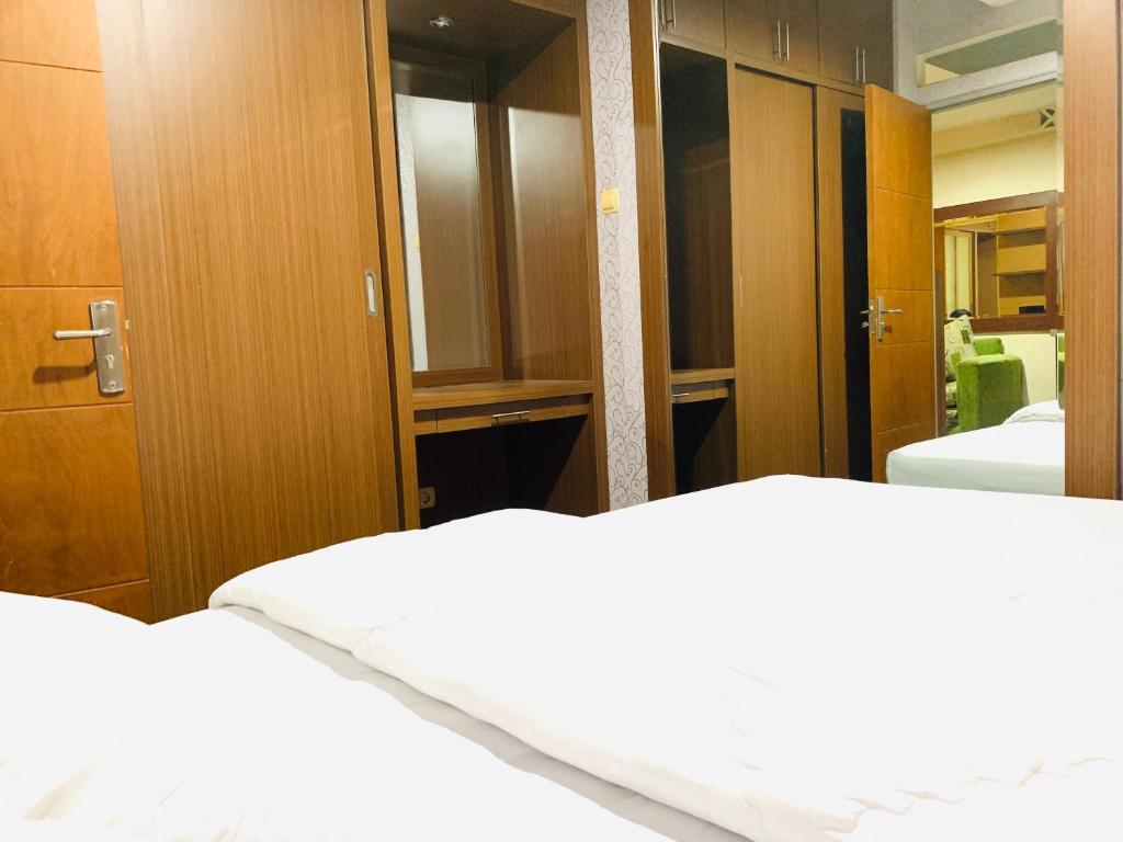 Apartemen Cibubur Village by Raja Sulaiman Property - Apartamento De Dos Dormitorios
