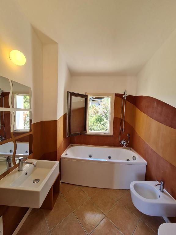 Fotografia z galérie ubytovania Holiday Homes v destinácii Porto San Paolo