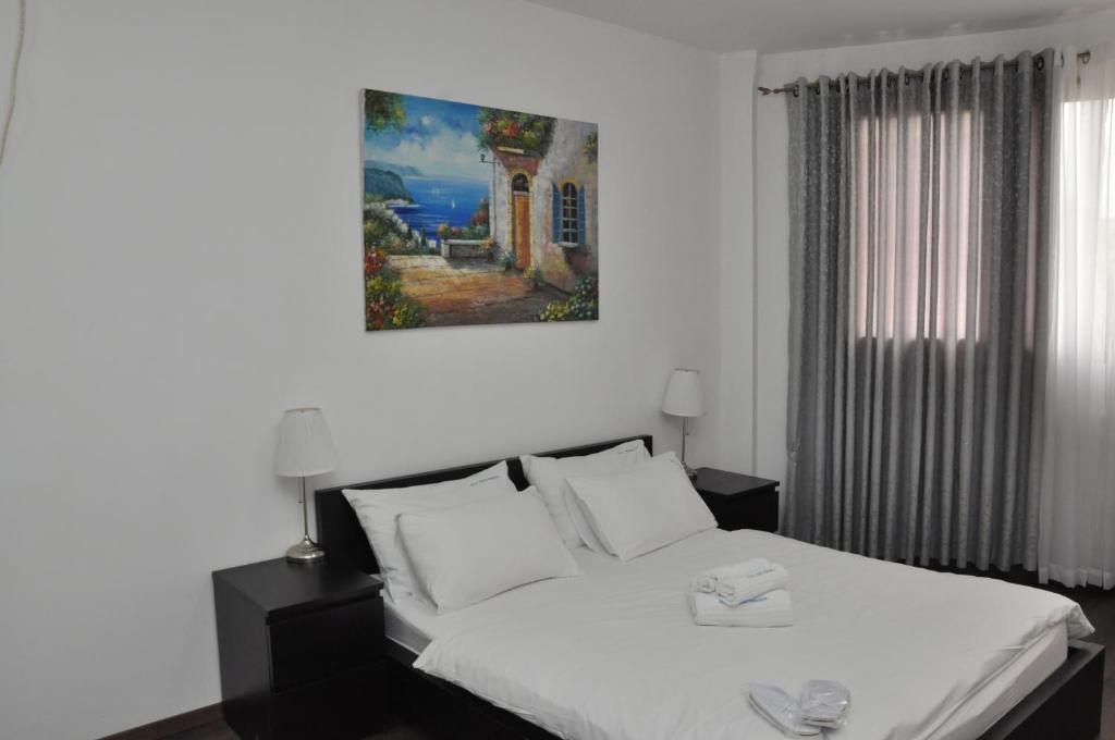 Ein Bett oder Betten in einem Zimmer der Unterkunft Star Apartments - Petah Tiqwa