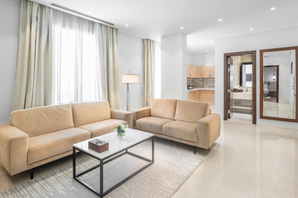 Posezení v ubytování Landmark Hotel & Suites فندق وأجنحة لاندمارك