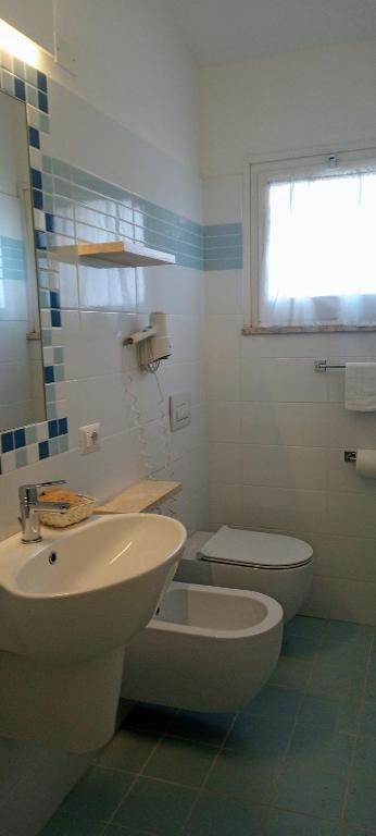 Koupelna v ubytování Albergo Medusa