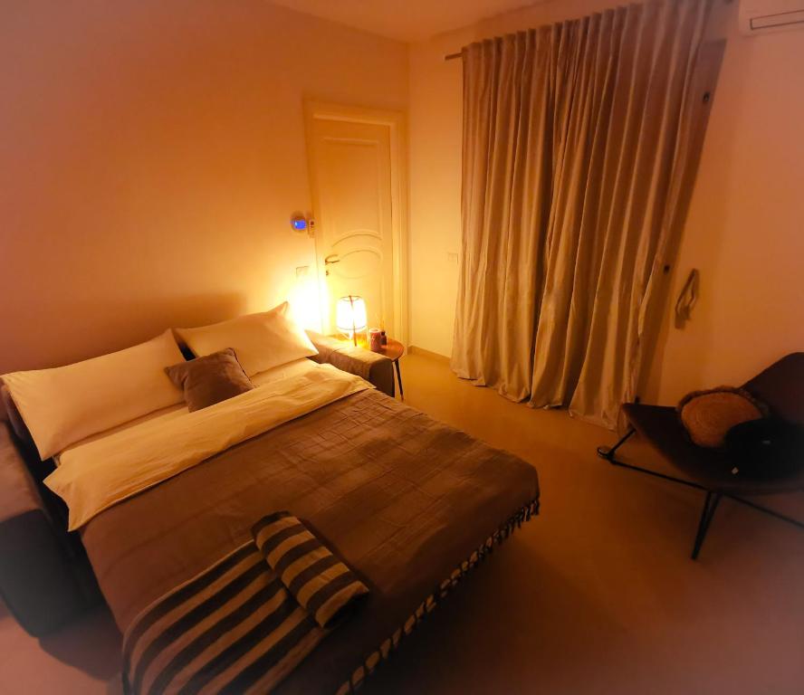 Posteľ alebo postele v izbe v ubytovaní Vicky's homestay Sanremo - C. CITRA 008055-LT-1257