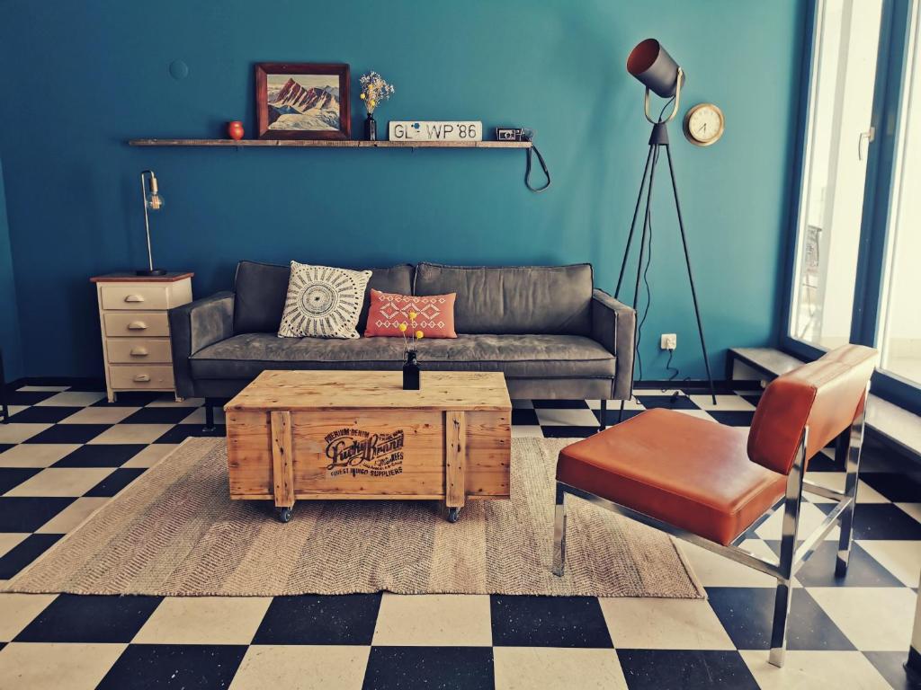 a living room with a couch and a coffee table at Backpackers Luzern in Lucerne