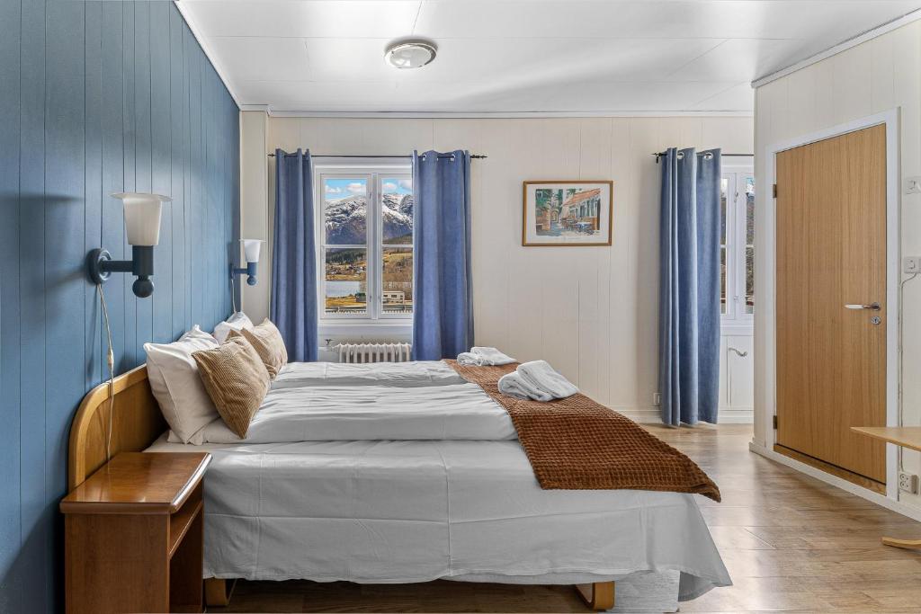 Postel nebo postele na pokoji v ubytování Hardanger Guesthouse